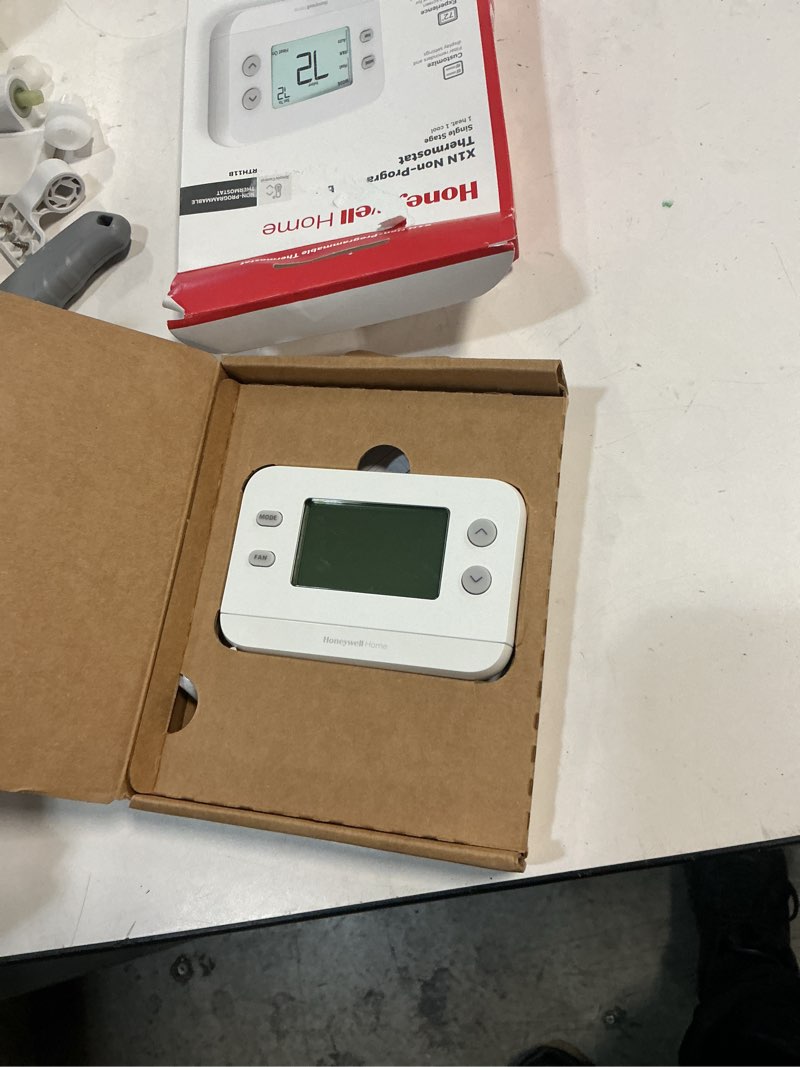 Condition photo showing New/Like New for honeywell home x1n heating and cooling push button non-programmable thermostat