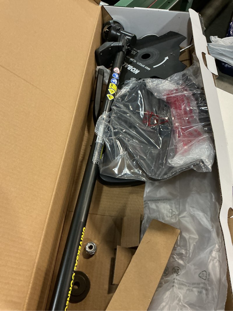 Condition photo showing As Is for kobalt universal brush cutter attachment