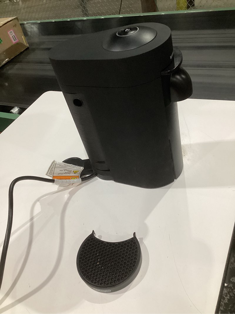Condition photo showing As Is for (used, incomplete parts)nespresso vertuo plus deluxe coffee and espresso maker by de'longhi, matte black