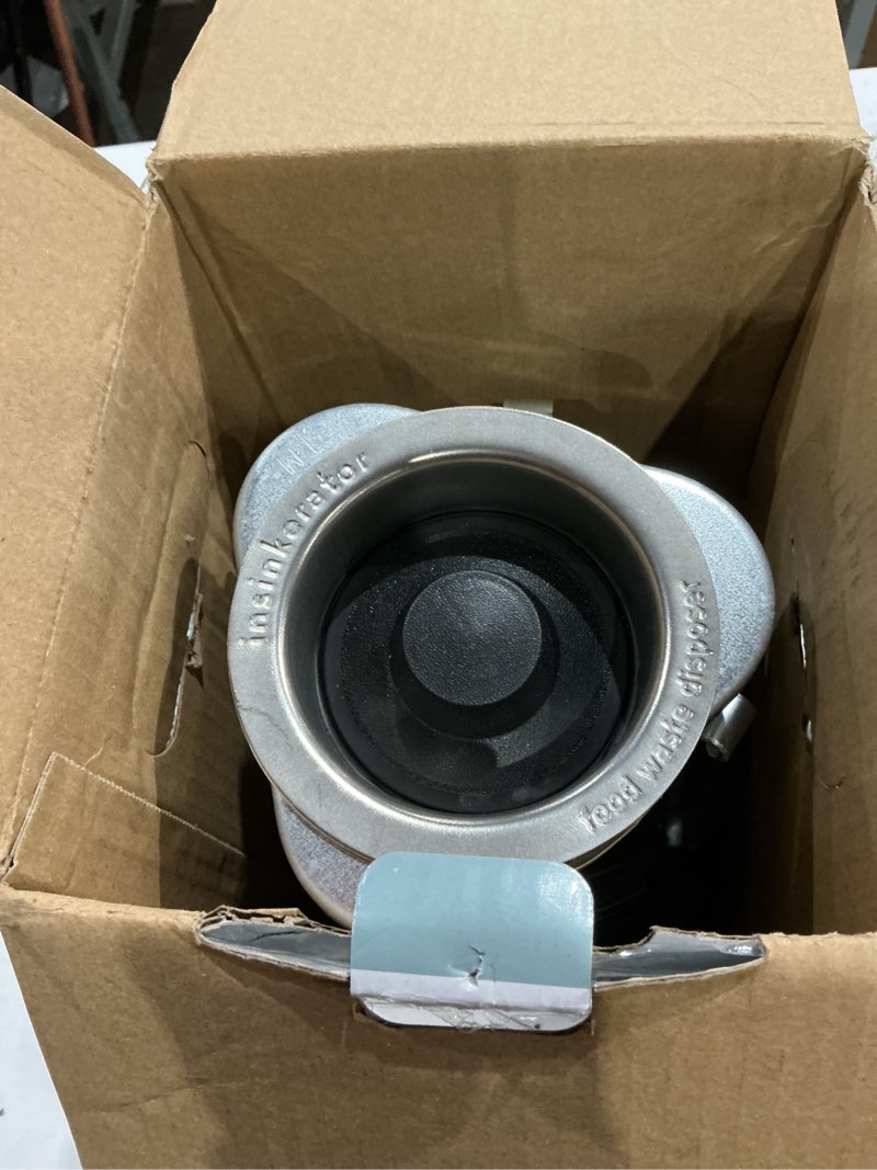 Condition photo showing As Is for turbogrind 1/2 hp. continuous feed garbage disposal with power cord