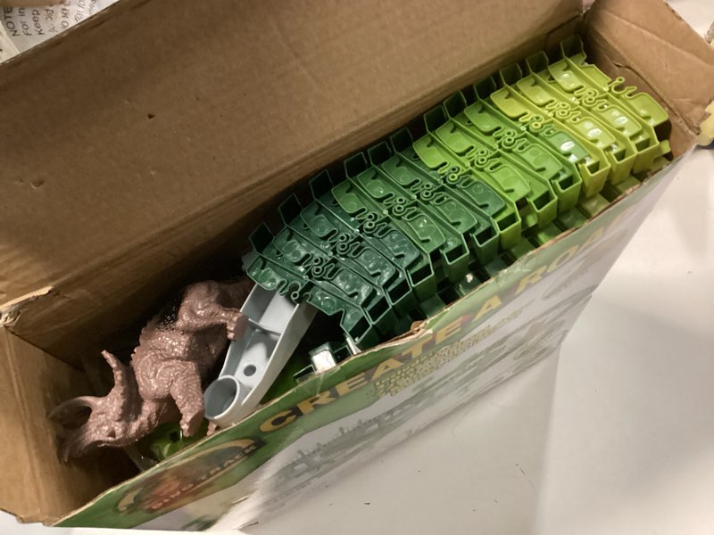Condition photo showing As Is for Dinosaur Tracks, 271 PCS Create A Dinosaur World Road Race for Kids Boys Toys Flexible Train Tracks Set with 2 Cool Race Cars and 2 Dinosaur Toys for Age 3 4 5 6 7 8 Year & Up Old Boy Girls Best Gift Dinosaur Race Tracks