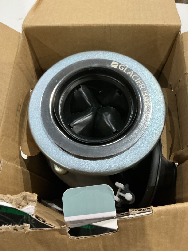 Condition photo showing As Is for turbogrind 1/2 hp. continuous feed garbage disposal with power cord