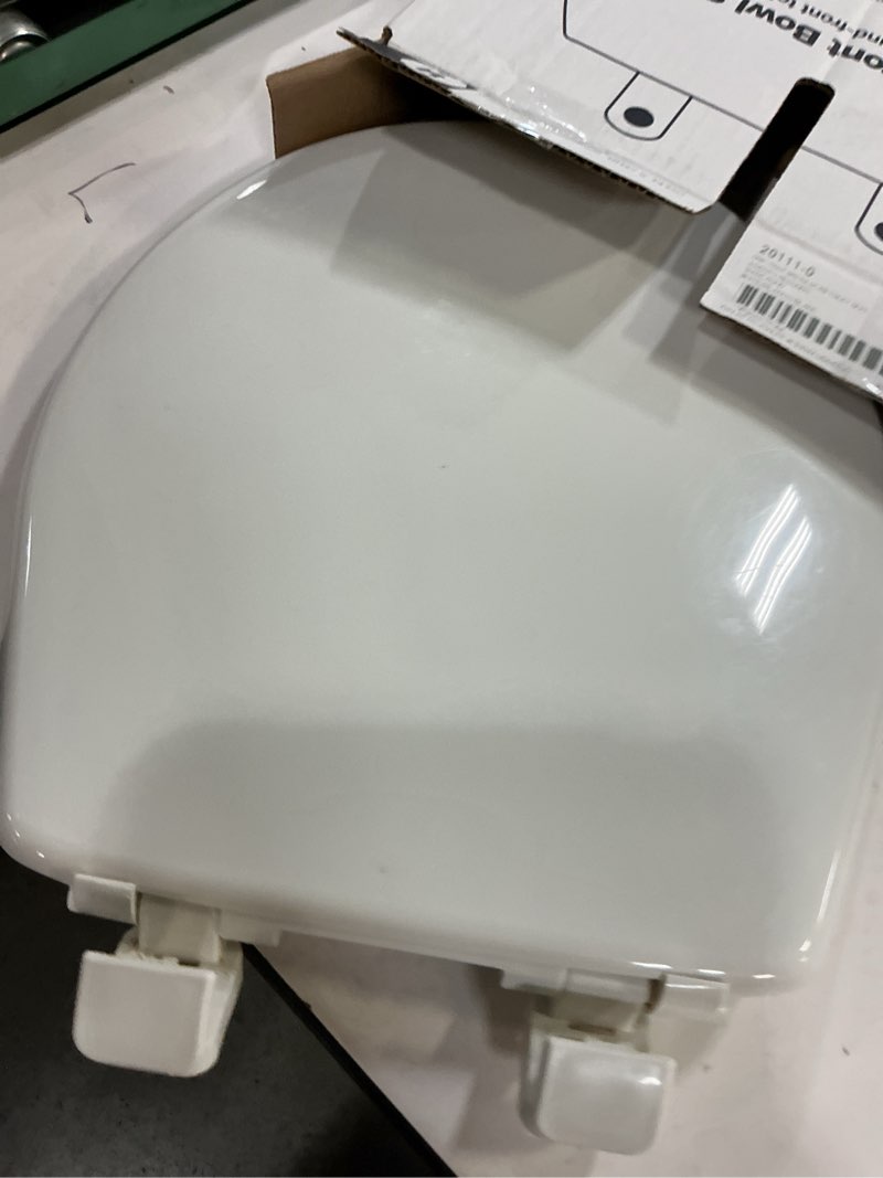 Condition photo showing As Is for kohler 20111-0 brevia, slow close toilet seat, round toilet seat, grip-tight bumpers quick-attach hardware, white
