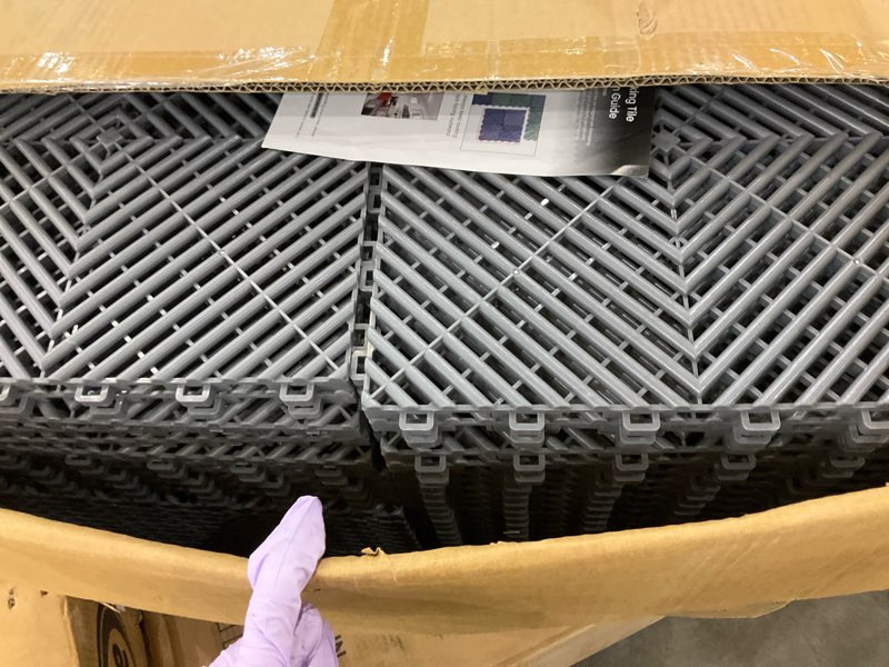 Condition photo showing As Is for 60-Pcs Interlocking Tile, 12" x 12" Indoor/Outdoor Self-Drainage Interlocking Floor Tiles, Non-Slip Heavy-Duty Polypropylene Splicing Flooring Tile for Garage Patio Pool Bathroom, Grey Grey 60-Pack