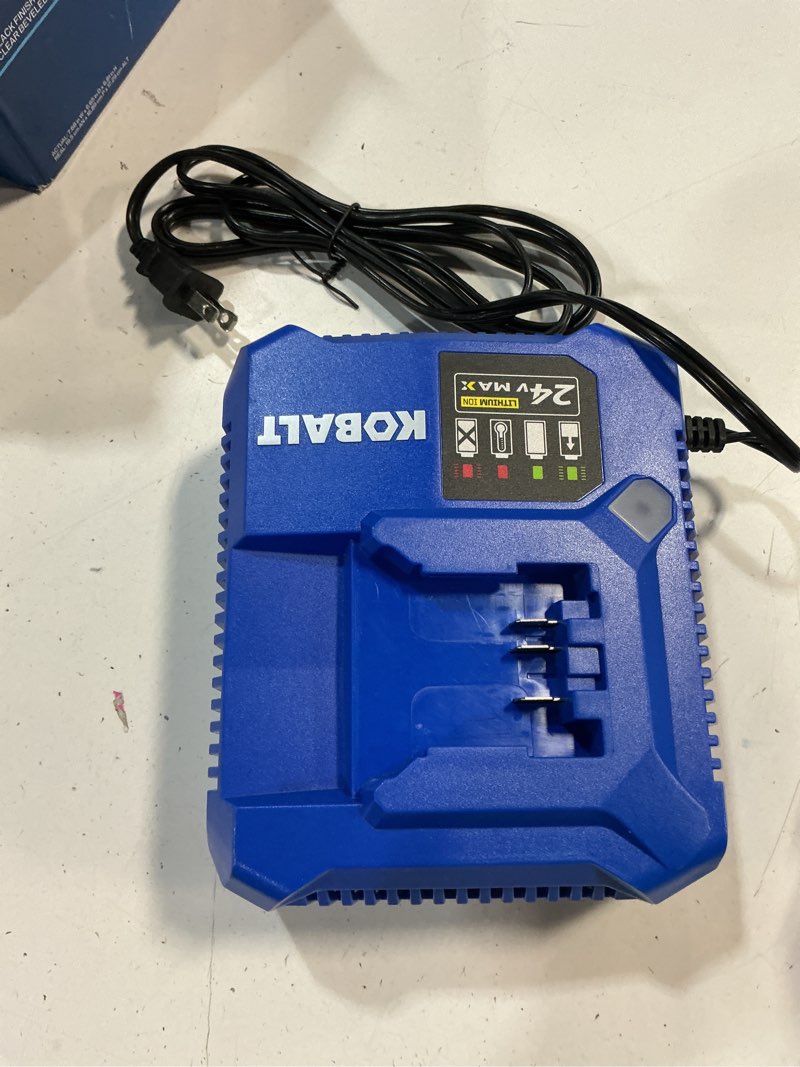 Condition photo showing As Is for kobalt 24-v lithium-ion battery charger