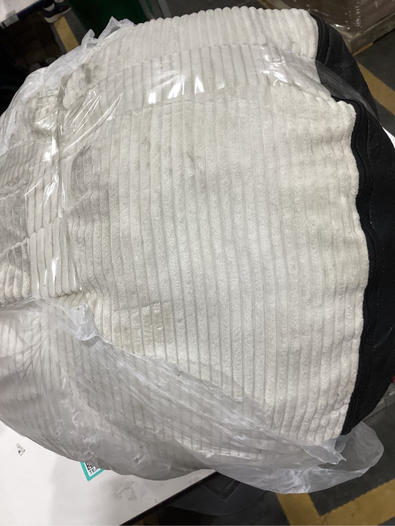 Condition photo showing As Is for HIGOGOGO Round Stuffed Pouf Ottoman, Corduroy Poufs with Foam Chunk Filling, Furry and Fluffy Pouf Foot Stool Storage Ottoman, 26 X 18 Floor Poufs Foot Rest for Living Room, Beige 26 inch Beige