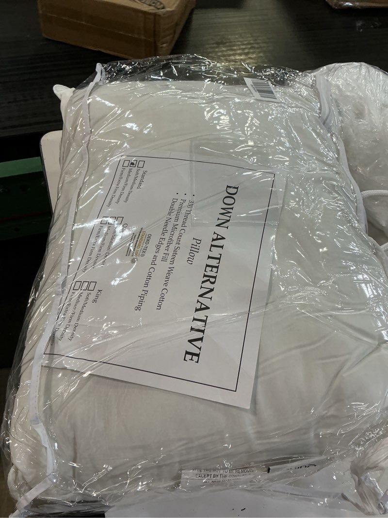 Condition photo showing New/Like New for premium down alternative pillow, king, soft/medium