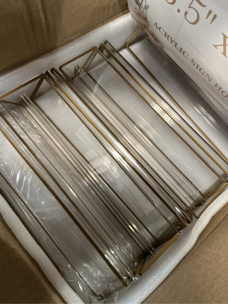 Condition photo showing New/Like New for ehwine 6 pack 8.5×11 clear acrylic sign holder with gold borders and vertical stand, double sided table menu holders picture frames for wedding table numbers, restaurant signs, photos and art display 6 pack 8.5×11 inch