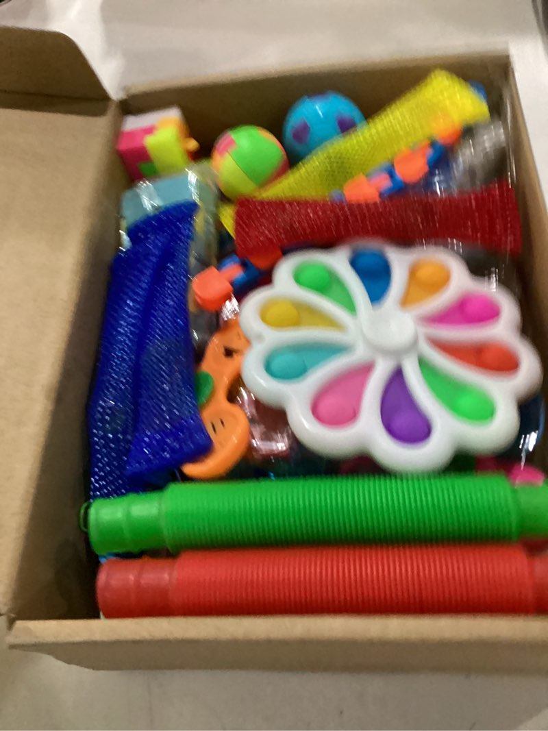 Condition photo showing Good Condition for fidget simple fidget pack, 35pcs fidget toys set with popping fidget sensory toys for kids and adults, stress relief kit gifts for party favors classroom prizes easter basket stuffers egg fillers