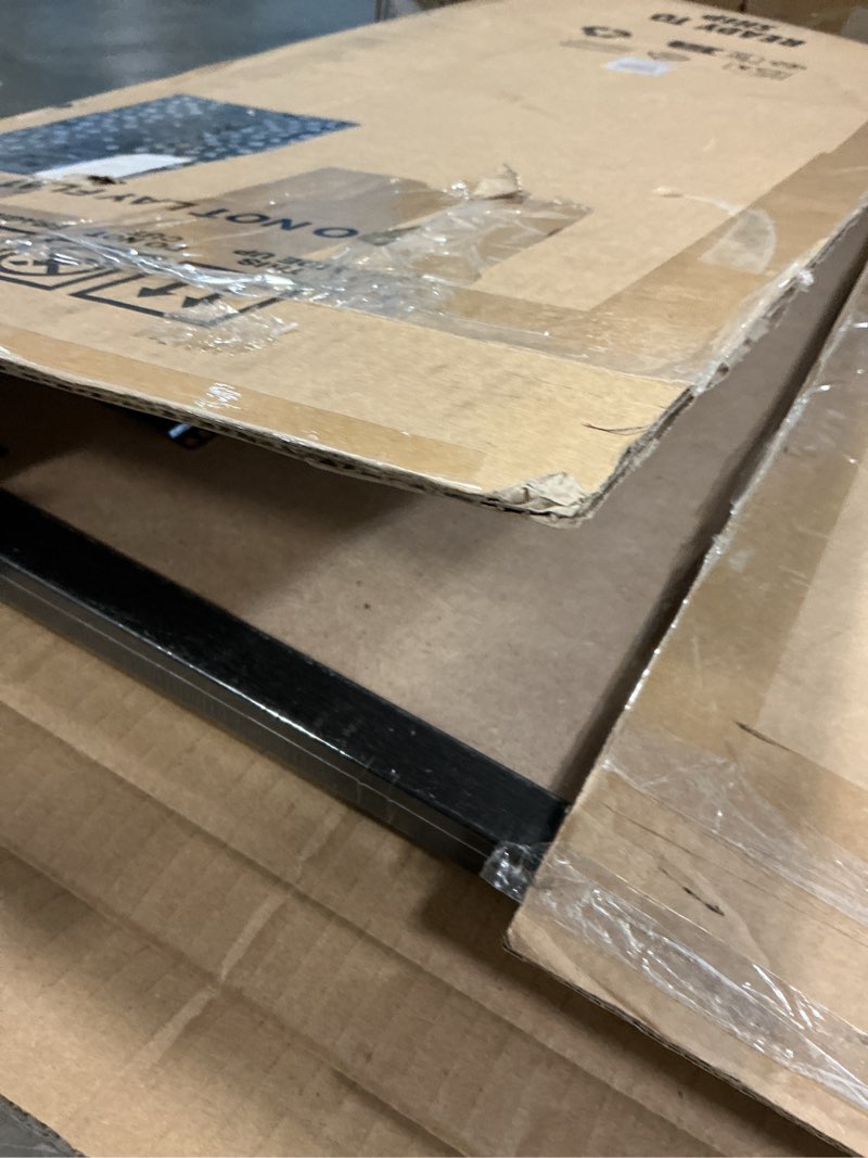 Condition photo showing Good Condition for mcs studio gallery 26x32 matted poster frame with 22x28 picture display, black woodgrain engineered wood vertical & horizontal wall hanging large picture frame for photos, posters & art prints (1-pack) 22x28 1-pack