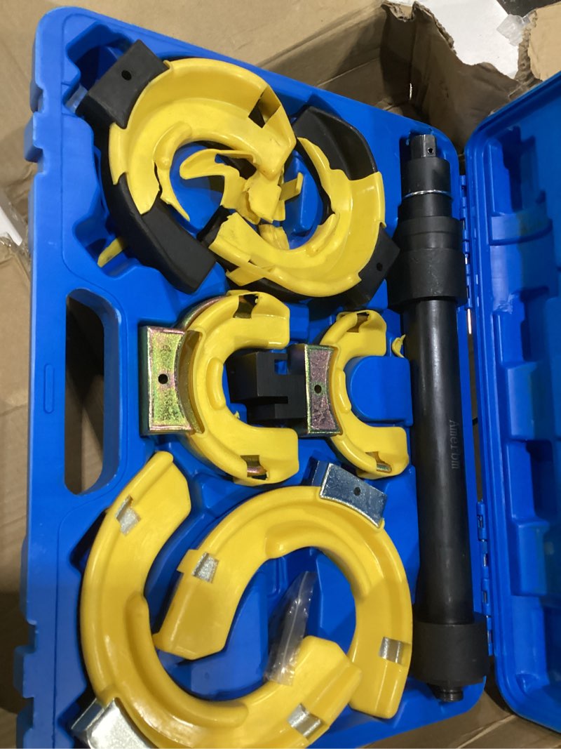 Condition photo showing As Is for vevor strut spring compressor set, macpherson strut spring compressor kit, interchangeable fork strut coil extractor remover tool, with yellow protective sleeve and carrying case 9921lb blue, similar to stock photo