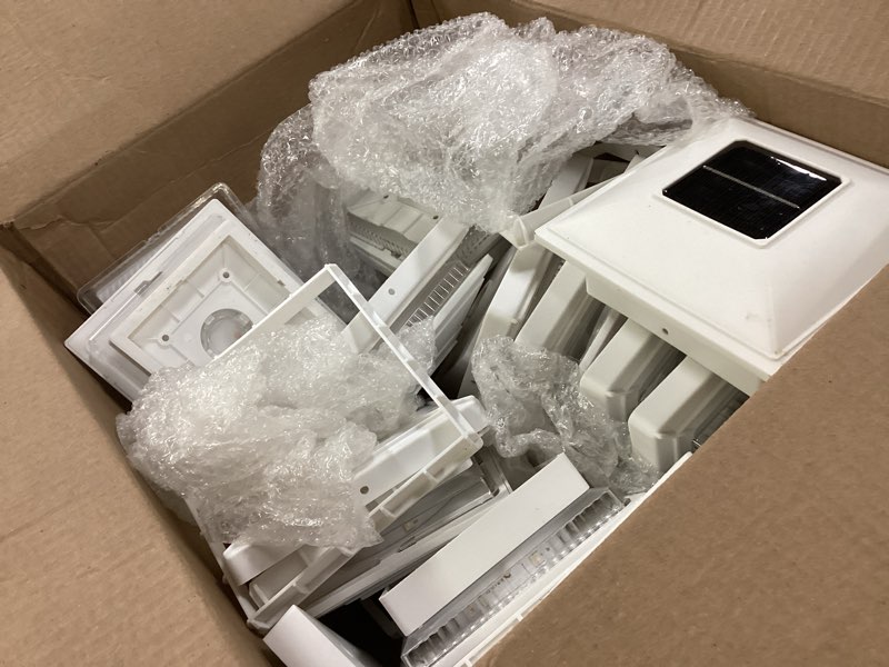 Condition photo showing As Is for 12Pack Solar Post Cap Lights - 8 RGB Color Changing Modes & Multicolor Flow, IP65 Waterproof - for 4x4/6x6 Wood & 4x4/55 Vinyl Fence Posts - Outdoor Deck, Patio, Garden Lights (White) White 12pack