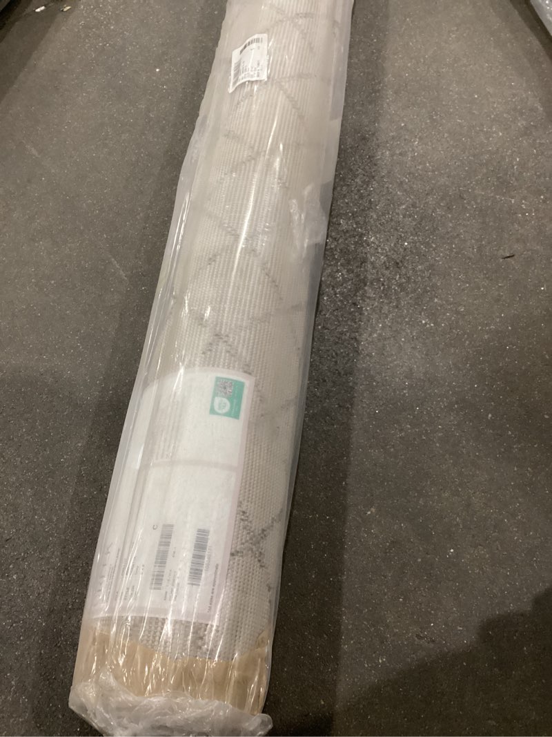 Condition photo showing New/Like New for Nuloom grey rug 5x8’