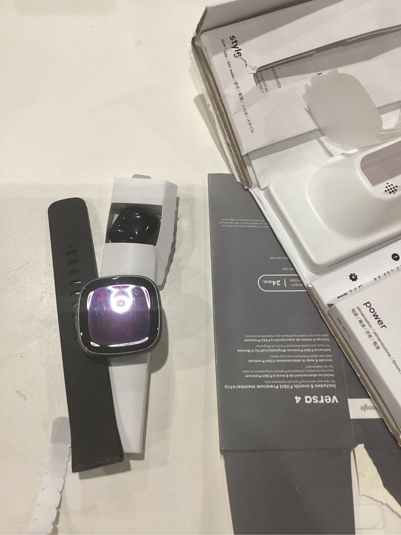 Condition photo showing Good Condition for USED NOT TESTED Fitbit Versa 4 Smartwatch (Bundle) – GPS Fitness Tracker with Fast Charger & Cleaning Cloth, 40+ Exercise Modes, Heart Rate, Sleep, Step, & Workout Tracking for Android & iPhone, Black/Graphite