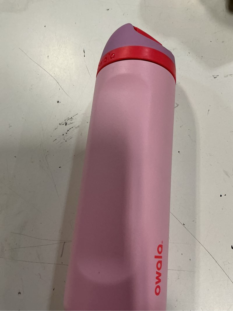 Condition photo showing As Is for owala freesip insulated stainless steel water bottle with straw for sports and travel, bpa-free sports water bottle, 24 oz, pink, angel food cake angel food cake 24 ounces
