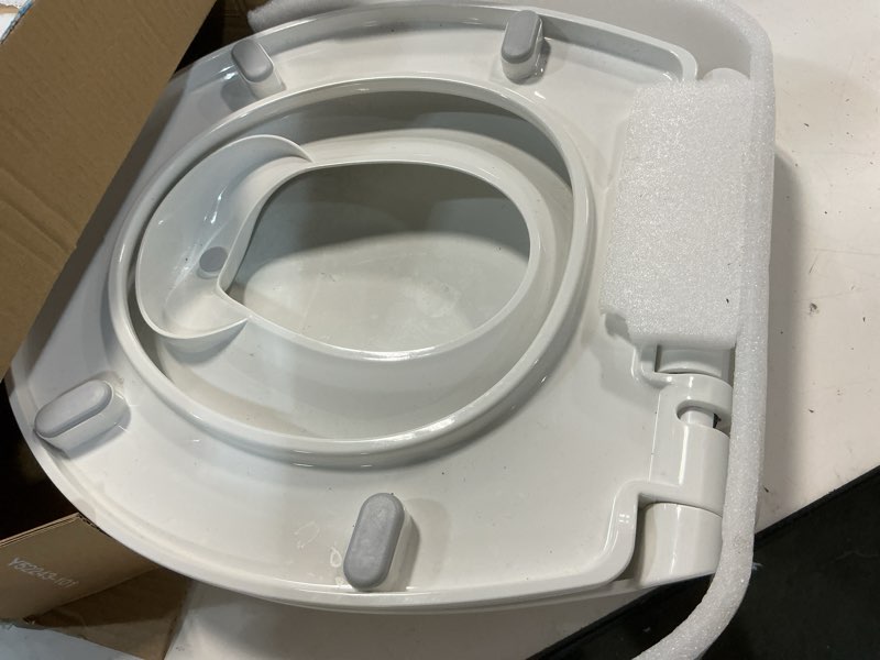 Condition photo showing As Is for quick flip toilet seat with built-in potty & splash guard for toddler training, slow close - jool baby (round)