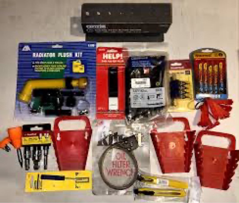 Mixture of small miscellaneous loose tools, screws, latches, home repair accessories