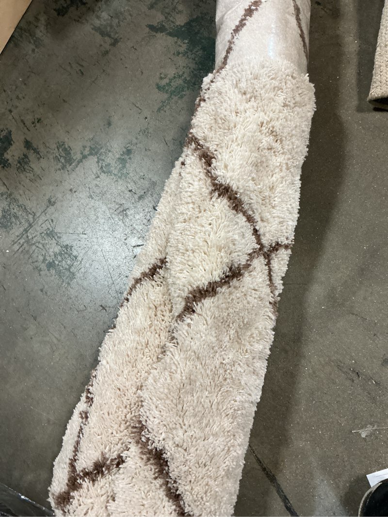 Condition photo showing As Is for 7'x10' organic diamond shag area rug brown - threshold™: high pile, fade & stain-resistant, indoor us