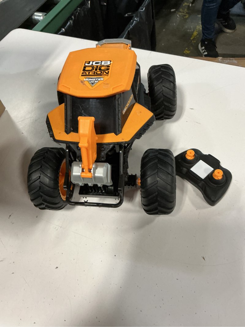 Condition photo showing Good Condition for monster jam jcb digatron remote control vehicle with lights, 1:15 scale (walmart exclusive)
