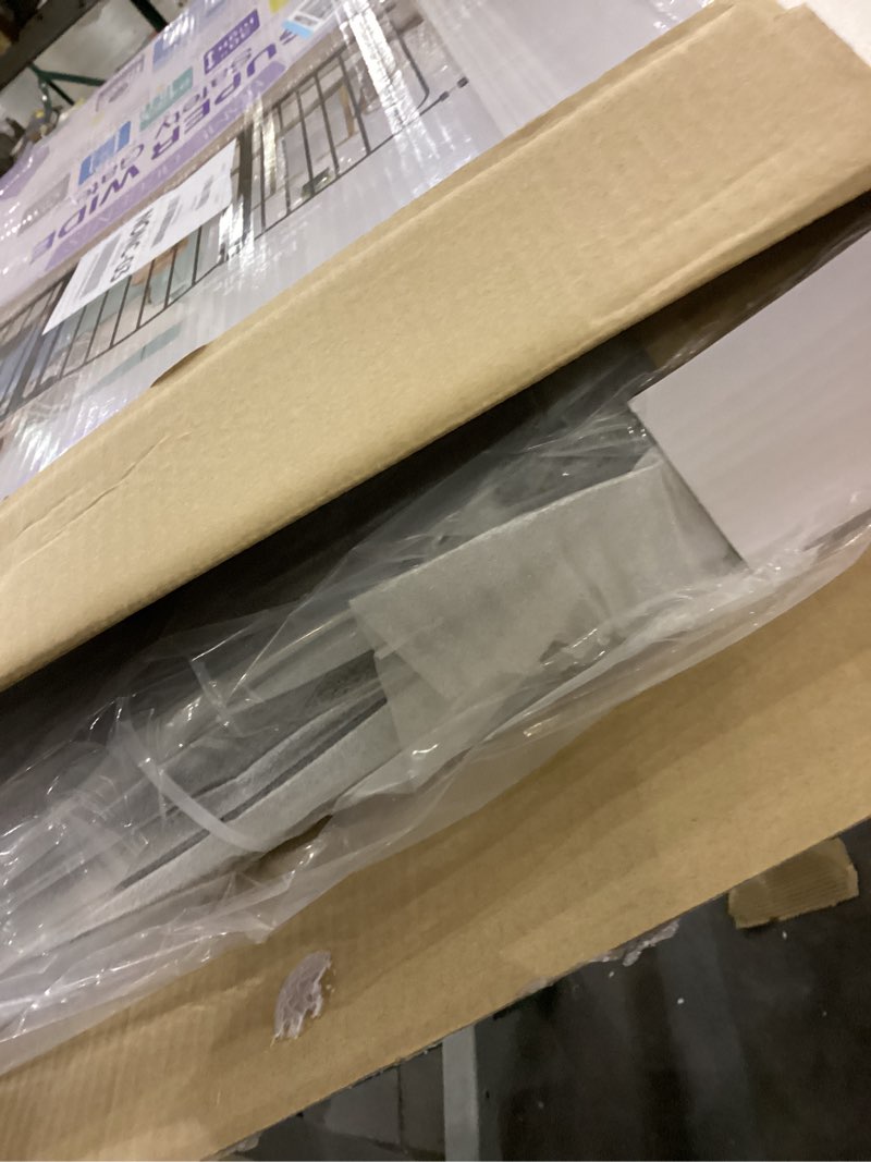 Condition photo showing New/Like New for Regalo 58-Inch Easy Step Extra Tall Arched Décor Walk Thru Baby Gate, Award Winning Brand, Includes 4-Inch Extension Kit, 4 Pack Pressure Mount Kit and 4 Pack Wall Mount Kit, Bronze Black - 29-58"w X 30"h