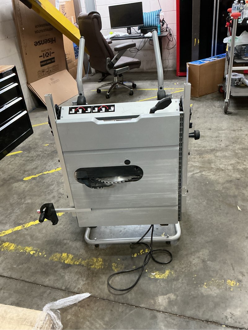 Condition photo showing As Is for kobalt 10-in 15 -amp 120 -volt portable jobsite table saw with foldable rolling stand