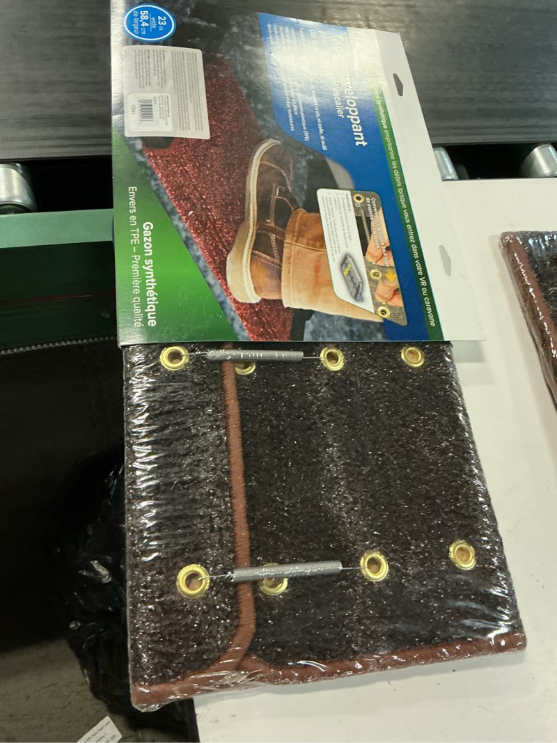 Condition photo showing New/Like New for camco 42944 premium wrap around rv step rug (turf material (22" x 23"))brown