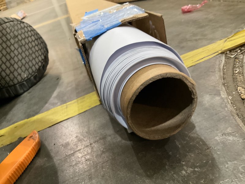 Condition photo showing Good Condition for long white material roll