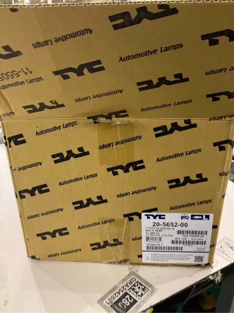 Condition photo showing As Is for TYC 20-5652-00 Toyota 4 Runner Driver Side Headlight Assembly