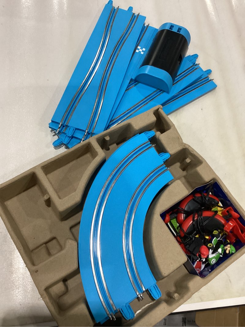 Condition photo showing As Is for Carrera First Nintendo Mario Kart Slot Car Race Track - Includes 2 Cars: Mario and Luigi - Battery-Powered Beginner Toy Racing Set for Kids Ages 3 Years and Up