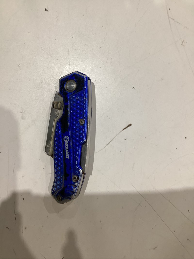 Condition photo showing As Is for kobalt blue lockback 3/4-in 11 -blade folding utility knife