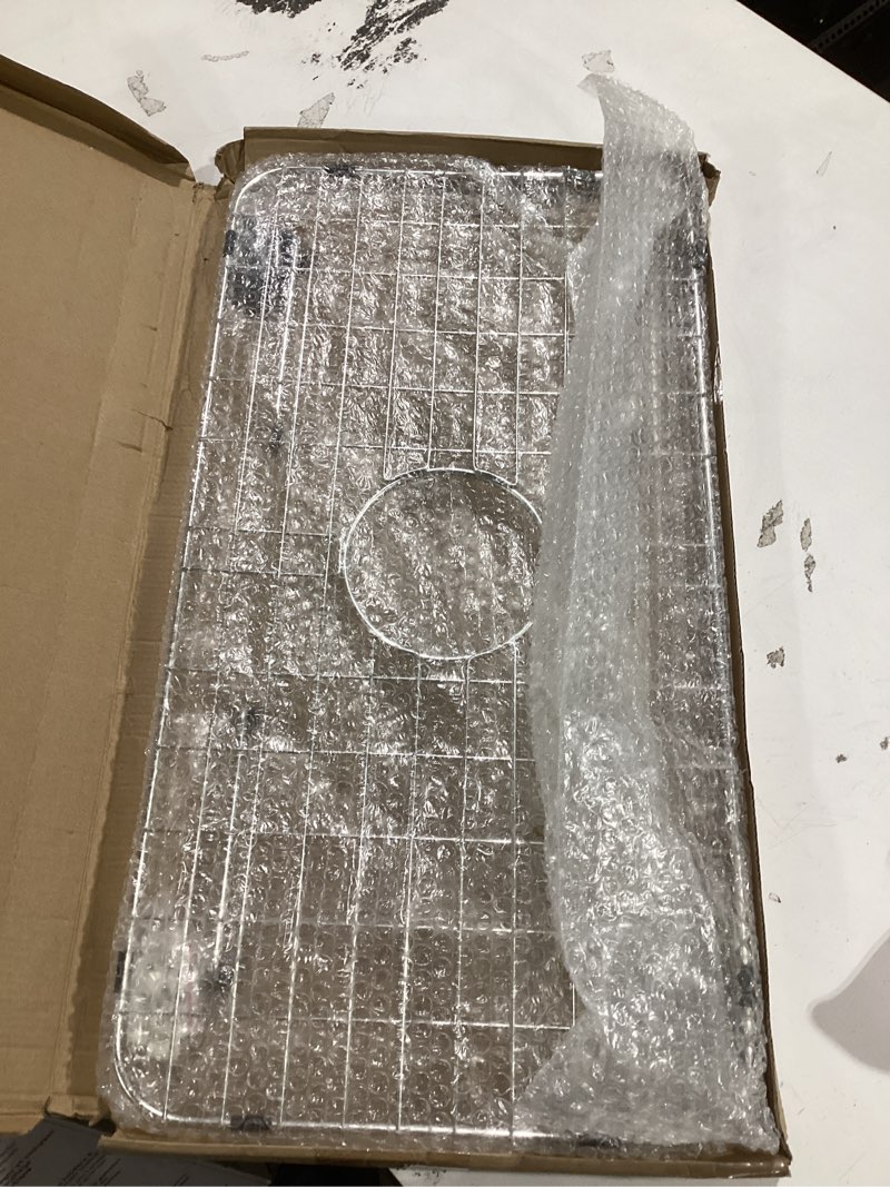 Condition photo showing Good Condition for sink bottom grid 24-1/8" x 12-5/8", centered drain with corner radius 1-1/2", sink protector for single bowl kitchen sinks 24-1/8" x 12-5/8" centered drain