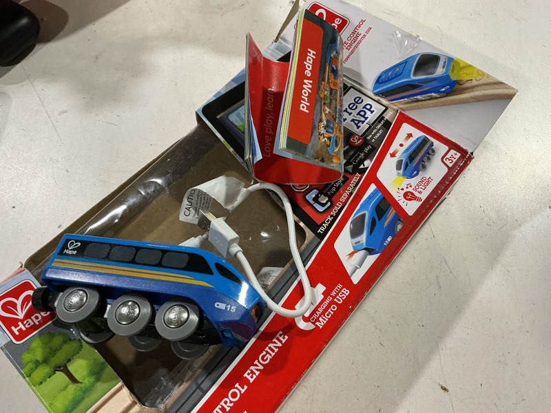 Condition photo showing As Is for hape remote control engine train | kids railway toy, app or button rc vehicle with 5 playable sounds, rechargeable battery feature, blue