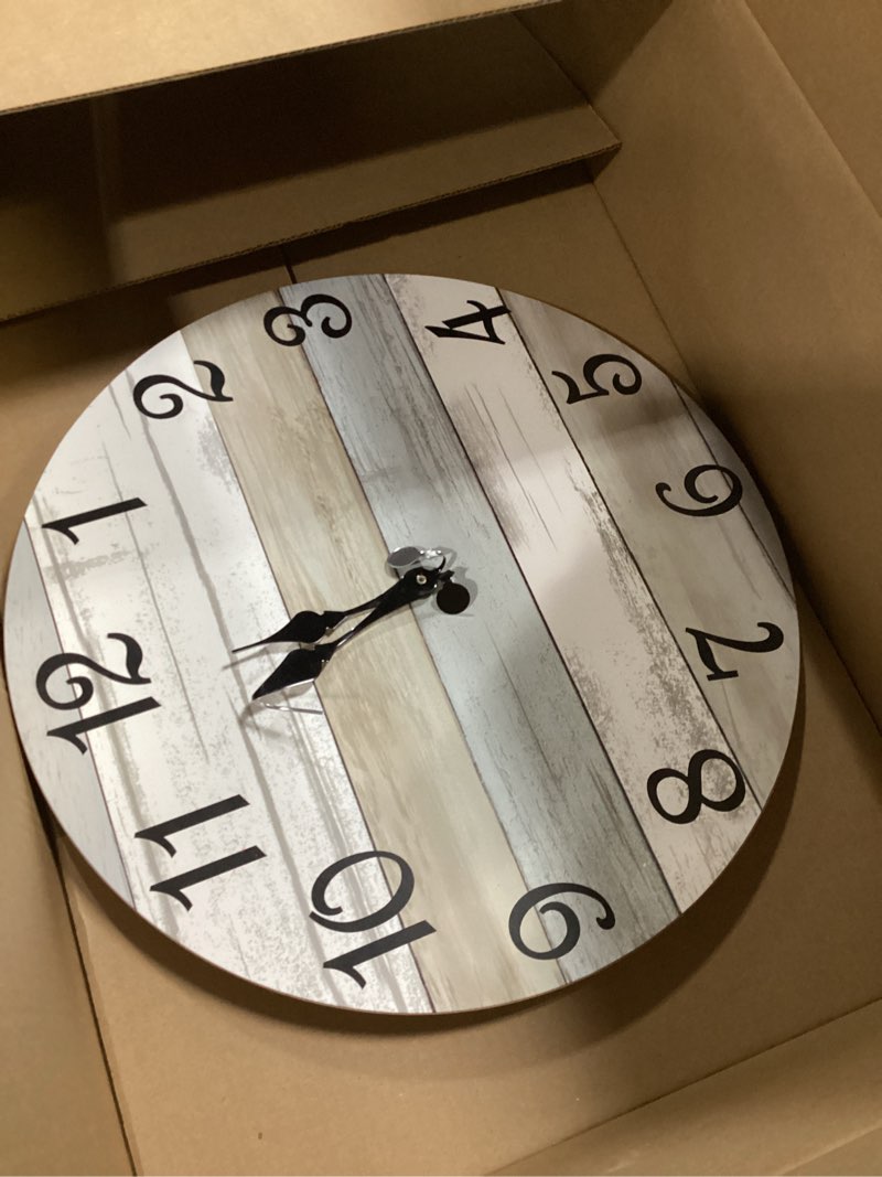 Condition photo showing As Is for CHYLIN Wall Clock - 16 Inch Silent Non Ticking Coastal Wall Clocks Battery Operated, Wooden Rustic Farmhouse Clock Decorative for Living Room, Kitchen, Bathroom, Office (Blue) 16 INCH B-white,brown,blue