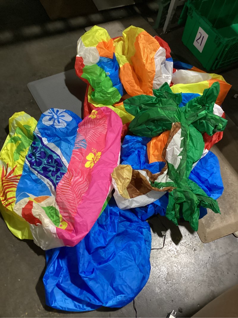 Condition photo showing As Is for 8ft blow up beach ball arch