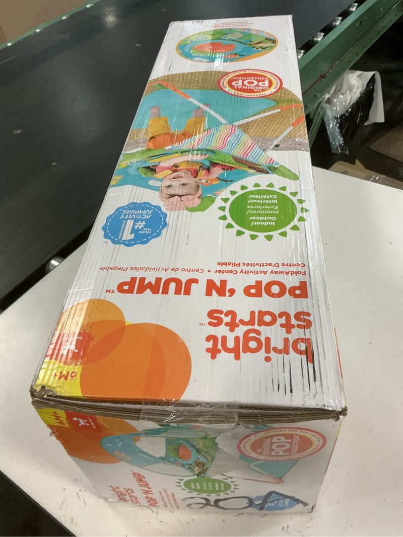 Condition photo showing New/Like New for bright starts pop 'n jump portable activity jumper, indoor/outdoor use, owl forest with 4 sensory toys, ages 6-12 months