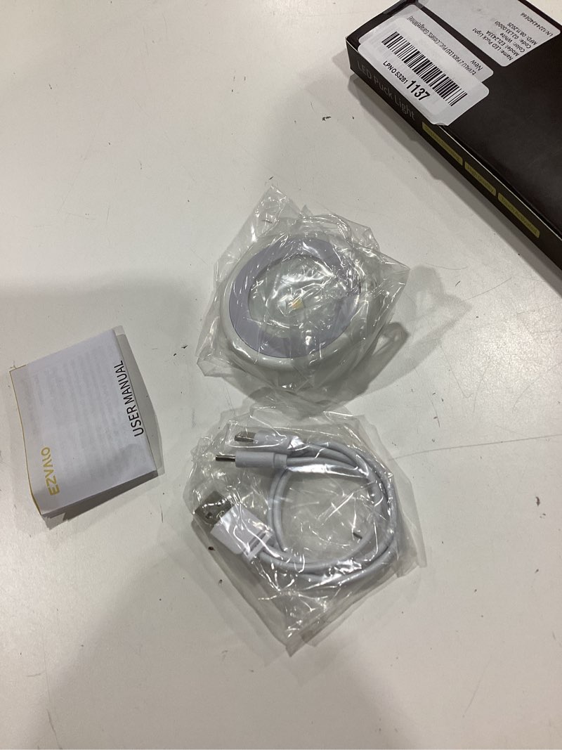 Condition photo showing Good Condition for ezvalo led puck lights, rechargeable battery touch light, 2.5'' mini tap lights, wireless closet light, under cabinet lighting, 3 color temps, stick on lights kitchen,closet,pantry(2 pack) white 2pack