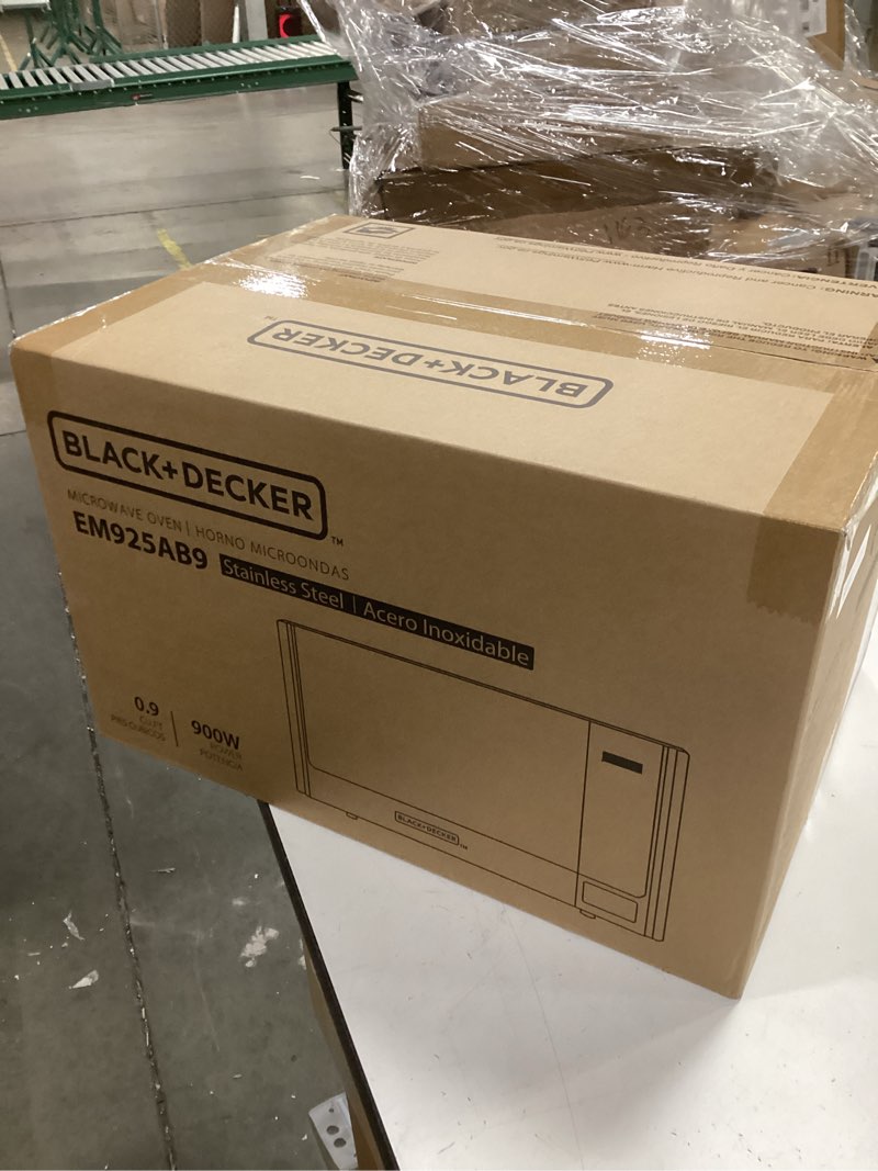 Condition photo showing New/Like New for BLACK+DECKER Digital Microwave Oven with Turntable Push-Button Door, Child Safety Lock, Stainless Steel, 0.9 Cu Ft 0.9 Cu.Ft