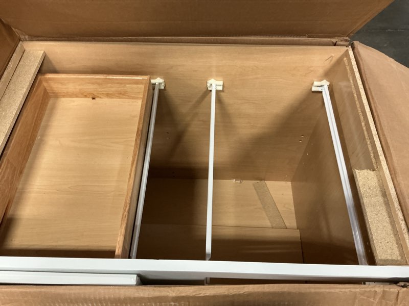 Condition photo showing As Is for courtland 36 in. w x 24 in. d x 34.5 in. h assembled shaker base kitchen cabinet in polar white