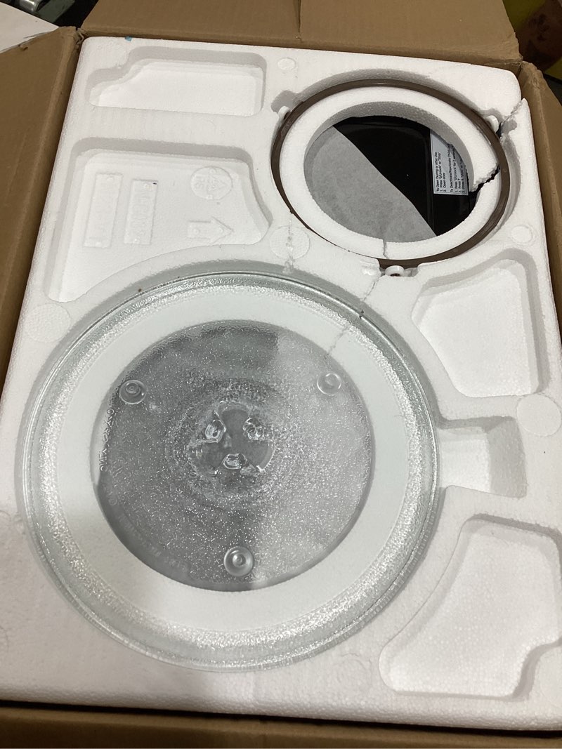 Condition photo showing As Is for kenmore countertop microwave, 6 auto-preset menus, child lock, defrost & express cooking features, 900 watt, .9 cu ft, stainless steel stainless steel 0.9 cu ft