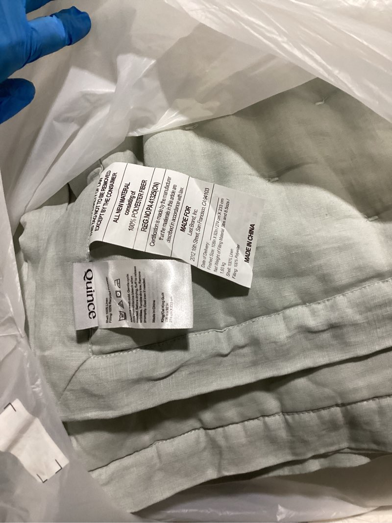 Condition photo showing As Is for **similar to** quince linen quilt king/cal ing