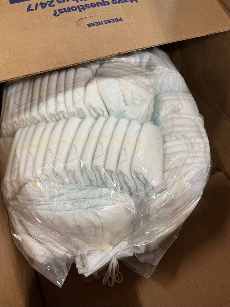 Condition photo showing As Is for pampers swaddlers diapers, size 0 (up to 10 lbs), 140 count, absorbent, keeps baby dry and comfortable, skin safe disposable baby diaper (packaging may vary) newborn 140