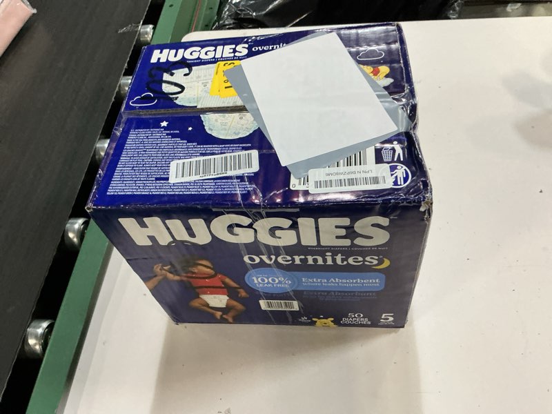 Condition photo showing New/Like New for huggies overnites size 5 overnight diapers (27+ lbs), 50 ct, packaging may vary size 5 50