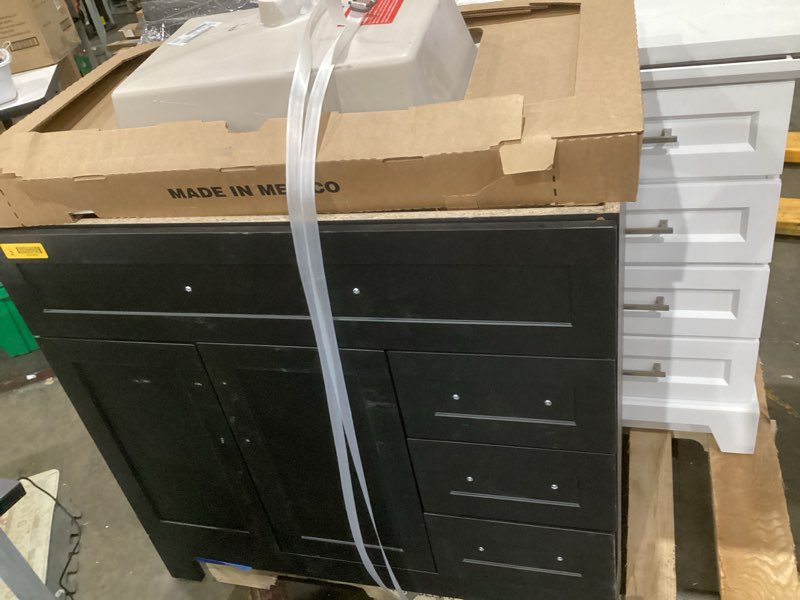 Condition photo showing As Is for 100+ bought last week style selections cauley 36-in black single sink bathroom vanity with white cultured marble top