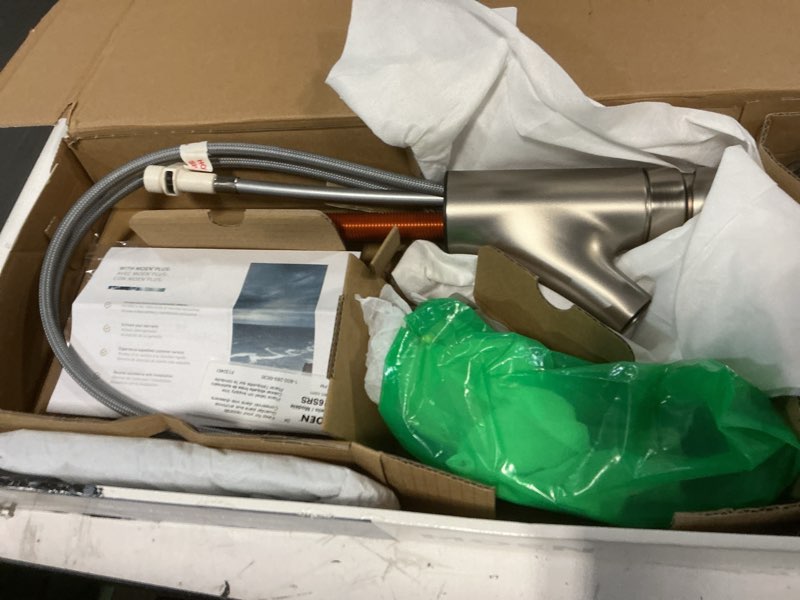 Condition photo showing New/Like New for moen renzo spot resist stainless one-handle pullout kitchen or laundry faucet featuring power clean, ca87316srs