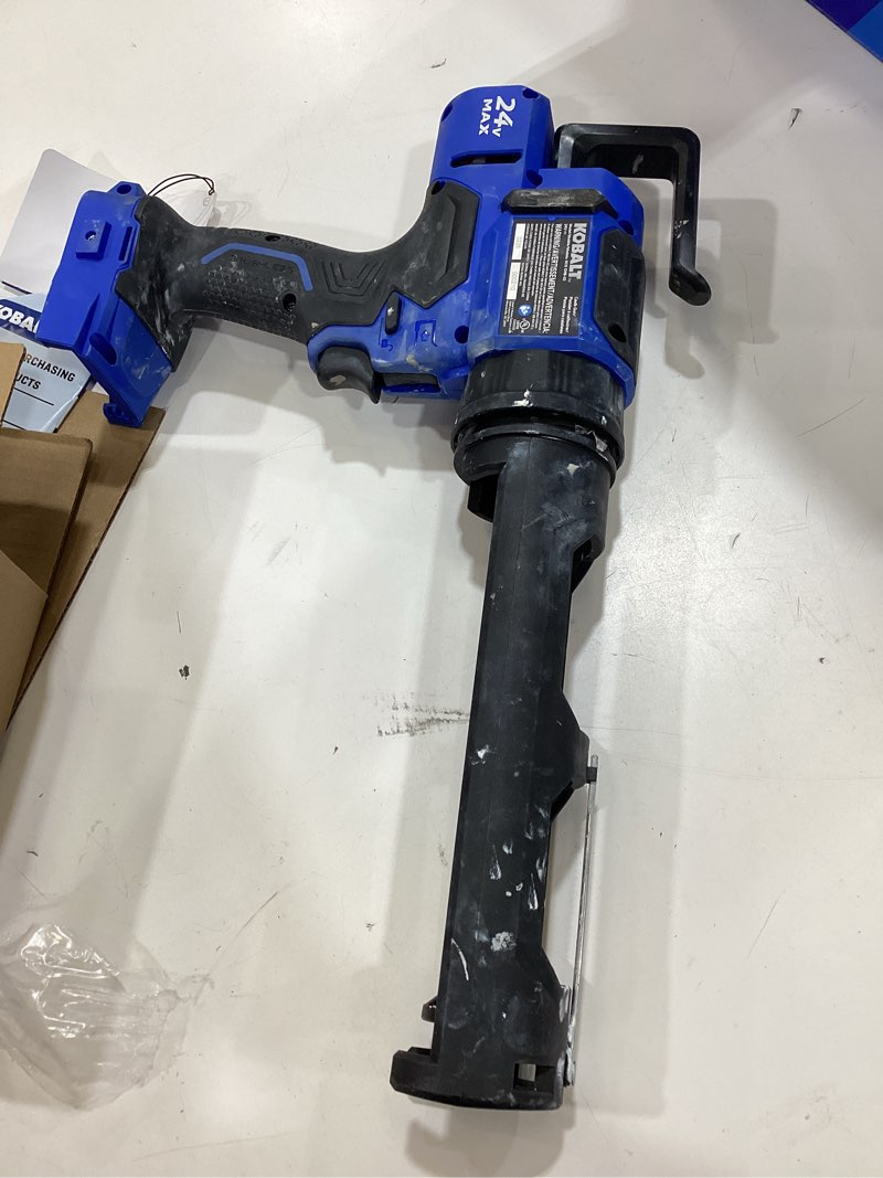 Condition photo showing As Is for kobalt 24-volt 10 -oz cordless anti-drip battery-powered caulk gun (bare tool)