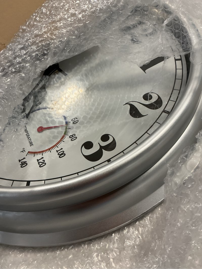Condition photo showing Good Condition for jenlystime 16 inch silver vintage waterproof indoor/outdoor wall clock with thermometer & hygrometer, large numerals & silent sweep movement - ideal for porch, garden, pool 16''ht silver