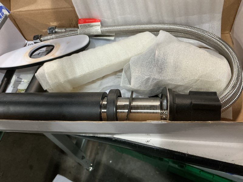 Condition photo showing As Is for better homes & gardens elmont single handle bathroom sink faucet  matte black  includes push pop-up drain