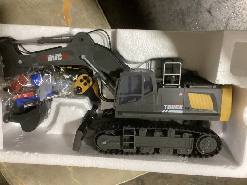 Condition photo showing Good Condition for 15 Channel RC Excavator Metal Shovel,RC Digger Construction Toys?Dozer Tractor,Simulated Smoke, Sound, Metal Digging Head, Best Gift for 3+ Old Boys Adults