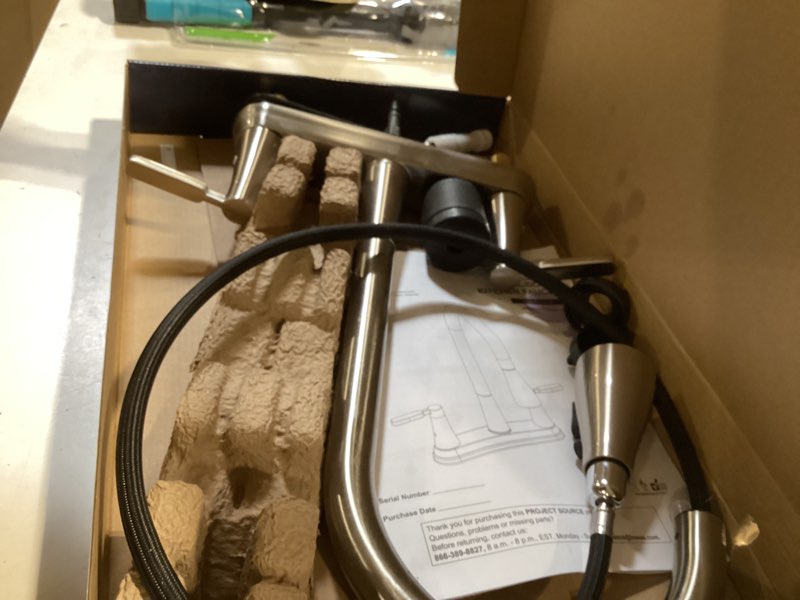 Condition photo showing As Is for project source stainless steel double handle deck-mount pull-out kitchen faucet with sprayer