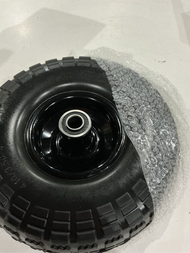 Condition photo showing Good Condition for ticonn 10" solid tires, 2 pack flat free 4.10/3.50-4'' wheels with 5/8” axle bore hole and double sealed bearings (black, 2pk) 10" 2pk black